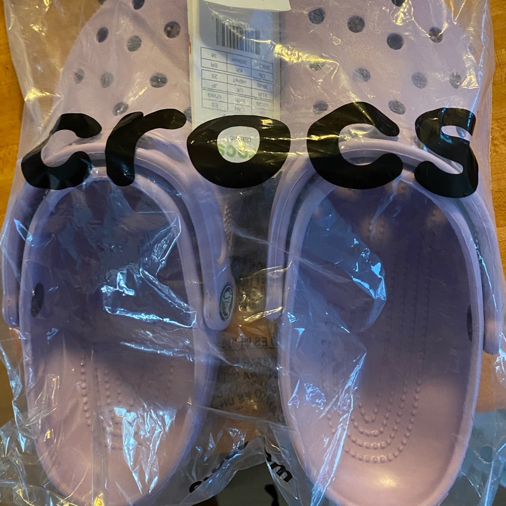 Lavender Crocs New w/tags. Womens size 9